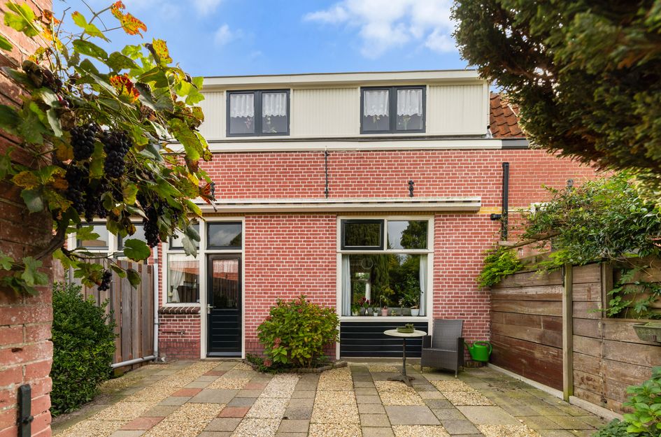 Tussenwoning te koop: Utrechtsestraatweg 59, Woerden