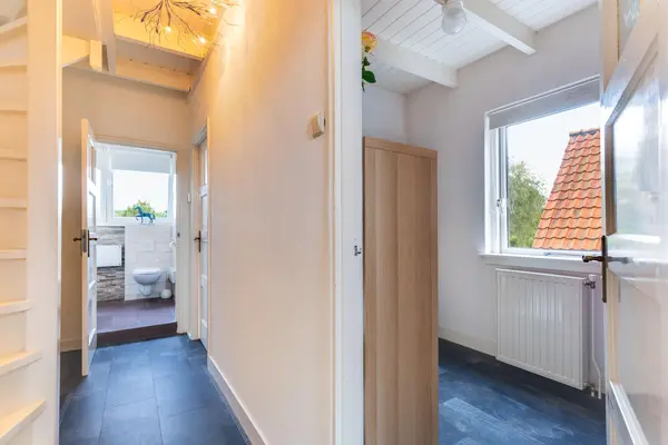 Limmerschouw 25, WINKEL